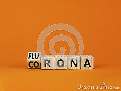 Covid-19 corona and flu flurona symbol. Turned a cube and changed the word corona to flurona. Beautiful orange table, orange Stock Photo