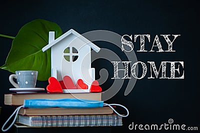 COVID-19 Coronavirus STAY HOME social media message, COVID-19 staying at home concept. Cute home interior, hearts in the house, Stock Photo