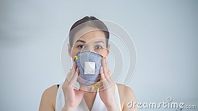 Covid19 Coronavirus symptoms. Asian woman with mask stay at home for protect from Coronavirus covid-19 Stock Photo