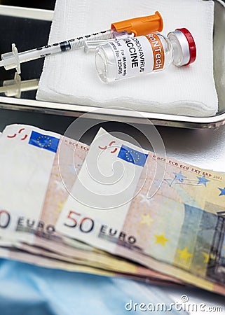 Covid-19 coronavirus vaccine for vaccination plan together with banknotes, conceptual image, recreation experimental treatment Stock Photo