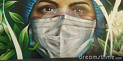covid doctors nurses graffiti wall mural virus safe Editorial Stock Photo
