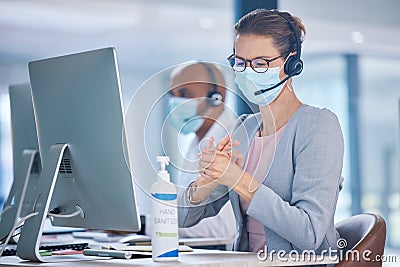 Covid, hand sanitizer and call center agent with mask cleaning hands, protecting or staying safe in customer support Stock Photo