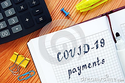 Covid payments phrase on the page Stock Photo