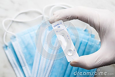 Covid-19 rapid antigen test. Rapid antibodies test kit in hand Stock Photo