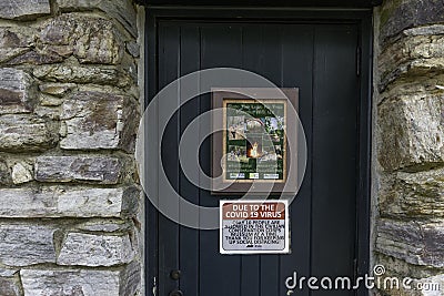 Covid sign on bath house at Lake Cheaha Editorial Stock Photo