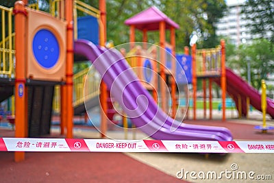 COVID19 tape barriers surrounding playground in Singapore Editorial Stock Photo