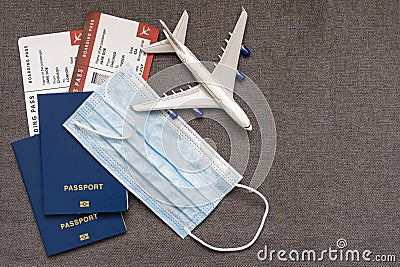 COVID-19 travel restriction due to corona virus mask wearing obligatory in airport and airplane flights to Europe Stock Photo