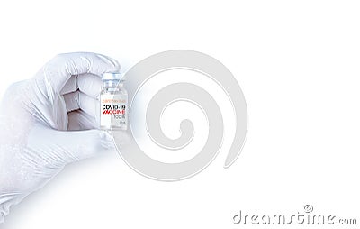 COVID-19 Vaccine concept in hand of scientist white vaccine jar isolated on white background Stock Photo