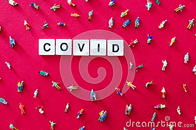 COVID word on red background Stock Photo