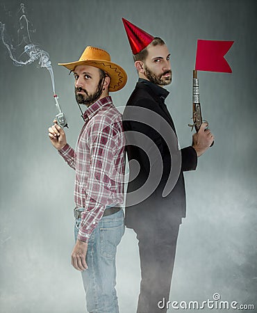 Cow boy and clubbed funny duel Stock Photo