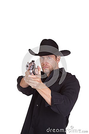 Cowboy aiming gun Stock Photo