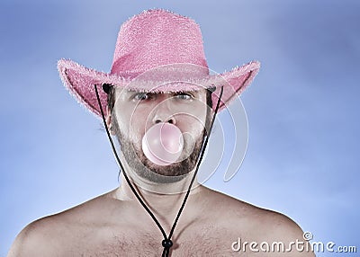 Cowboy blowing a gumball. Stock Photo