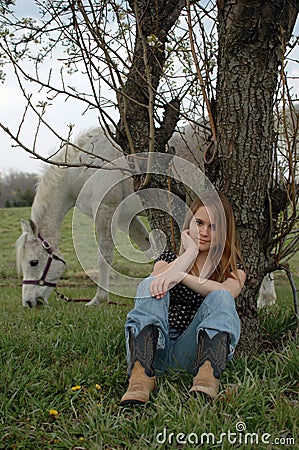 Cowboy boots and pretty girl Stock Photo