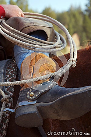 Cowboy Boots and Ropes Stock Photo