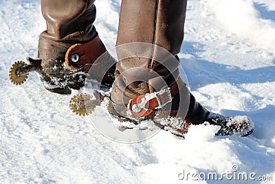 Cowboy Boots in the Snow Stock Photo