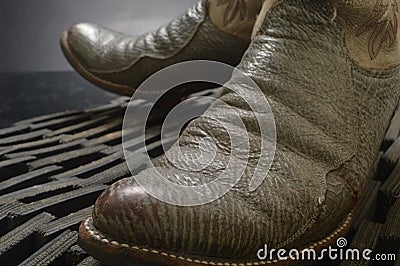 Cowboy boots on welcome mat Stock Photo