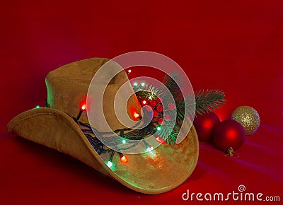 Cowboy Christmas.American West hat on christmas red background Stock Photo