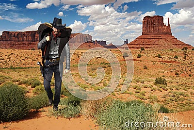 Cowboy crossing the desert Stock Photo