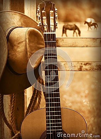 Cowboy hat and guitar.American music background Stock Photo