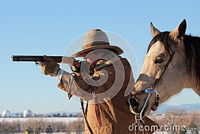 Cowboy With a Rifle Stock Photo