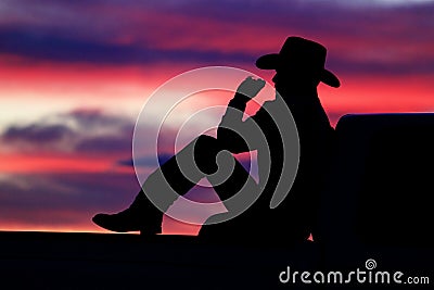 Cowboy Sunset Stock Photo