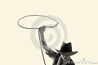 Cowboy throws a lasso Stock Photo