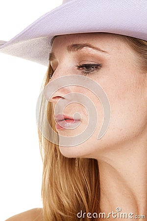 Cowgirl headshot side purple hat Stock Photo