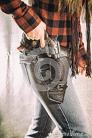 Cowgirl Woman Gunslinger Revolver Gun and Holster Stock Photo