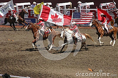 Cowgirls galloping on horseback Editorial Stock Photo