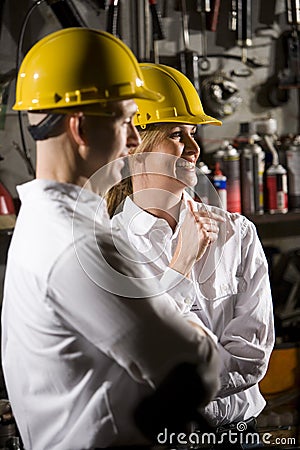 Coworkers in hard hats Stock Photo