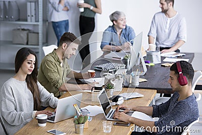 Coworkers in modern office Stock Photo