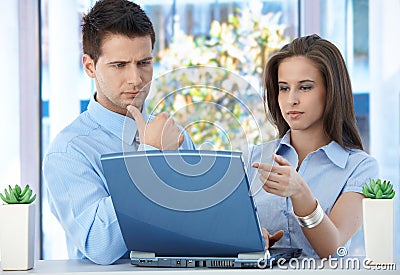 Coworkers in office concentrating on work Stock Photo