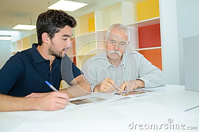 coworkers sharing information Stock Photo