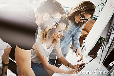 Coworkers Team Work Modern Office Place. Account Manager Showing New Business Idea Startup Presentation. Woman Touching Stock Photo