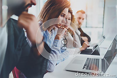 Coworkers team working with mobile computers at sunny meeting room.Horizontal. Stock Photo