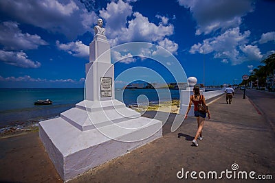 COZUMEL, MEXICO - MARCH 23, 2017: The monument of Doctor Adolfo Rosado Salas in the main street of the town Editorial Stock Photo