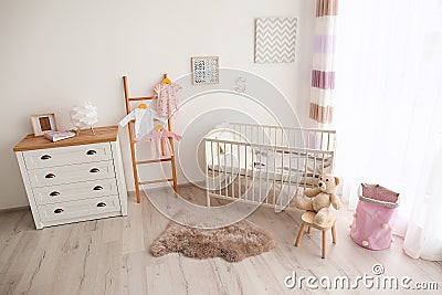 Cozy baby room interior Stock Photo