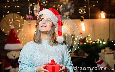 Cozy christmas atmosphere. Believe in miracle. Woman santa claus hat on christmas eve. Lady adorable cute face celebrate Stock Photo