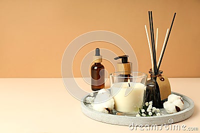 Cozy composition with scented candle for relaxation Stock Photo