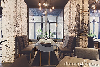 Cozy dining place at window, restaurant background Stock Photo