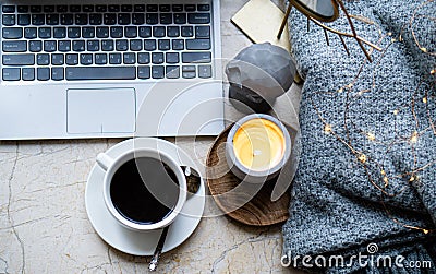 Cozy freelancer`s winter work place at home with cup of coffee Stock Photo