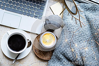 Cozy freelancer`s winter work place at home with cup of coffee Stock Photo