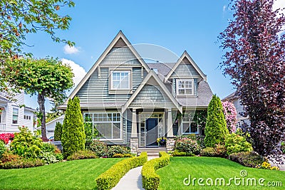 Cozy house with beautiful landscaping Stock Photo