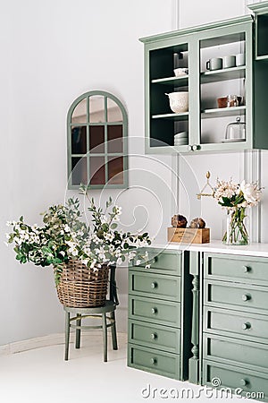Cozy kitchen corner with green vintage furniture Stock Photo