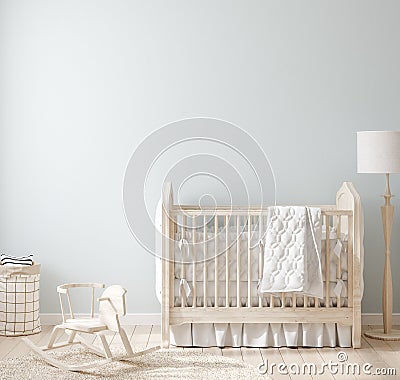 Cozy light blue nursery with natural wooden furniture Stock Photo