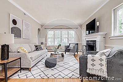 A cozy living room with neutral colored furniture. Editorial Stock Photo