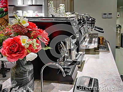 Cozy and modern coffee shop | delicious coffee | Interior design | Coffee barista and machines Editorial Stock Photo