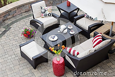 Cozy Patio Furniture on Luxury Outdoor Patio Stock Photo