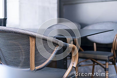 A cozy place for business negotiations in a cafe with elegant chairs with a wooden light curved frame Stock Photo