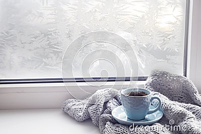 Cozy soft gray blanket with a cup of coffee Stock Photo